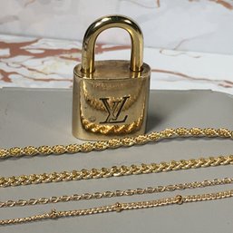 Fabulous Genuine LOUIS VUITTON Lock Mounted As Necklace Pendant - Comes With Four Different Chains - WOW !