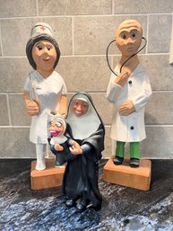 Pair Of Carved Wood Sculptures- Nurse And Doctor & Happy Habits- Studio Collection Deb Wood Sister Mary Paul