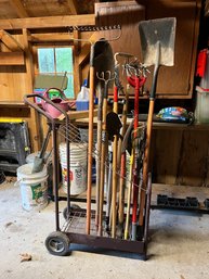 Group Of Yard Tools On Rolling Cart