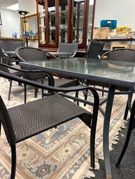 Square Metal Glass Top Patio Table With 4 Metal Chairs With Wicker Backs And Seats