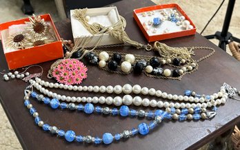 An Assortment Of Vintage Costume Jewelry