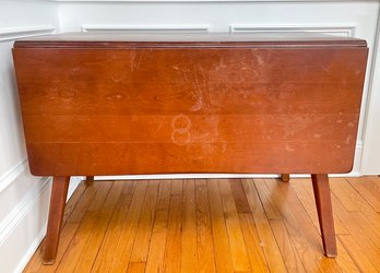 A Vintage Mid Century Maple Drop Leaf Dining Table