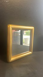 A  Small Gold Framed Mirror  By Framings Armonk, NY 12' X 12'
