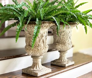 A Pair Of Cast Stone Classical Urns With Faux Ferns