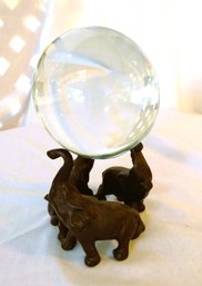 Clear Glass Ball On Metal Elephant Base