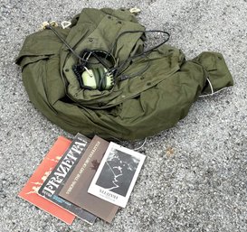 1970's Headphones, A Military Jacket, And Art Books