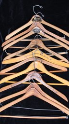 LOT OF 10 SIGNED VINTAGE WOODEN HANGERS  A