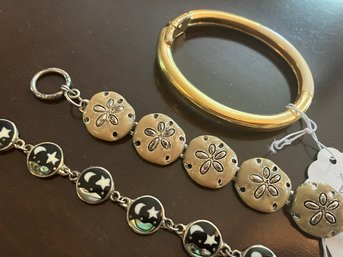 A Trio Of Costume Bracelets