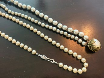 A Baroque Pearl Choker By Miriam Haskell And A Faux Pearl Necklace