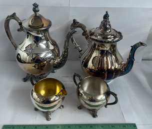 2 Silver Plate Teapots And Cream And Sugar