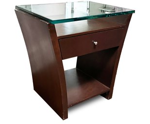 A Modern Glass Top End Table Or Nightstand