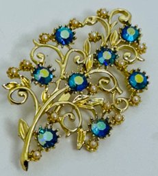 PRETTY BLUE AURORA RHINESTONE GOLD TONE FLORAL BROOCH