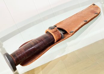 A Western Knife In Leather Sheath