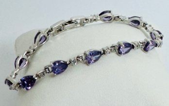 PRETTY SILVER TONE PURPLE AND WHITE STONE LINK BRACELET