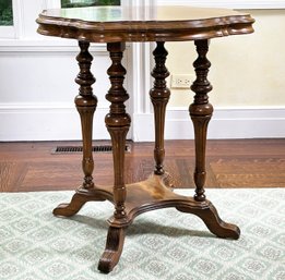 An Antique Mahogany Spindle Based Occasional Table