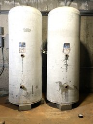 A Pair Of Galvanized 120 Gallon Storage Tanks