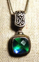 Fine Sterling Silver Necklace With Sterling Silver Pendant Having Blue/green Faceted Stone