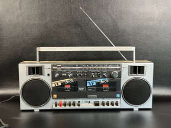 A Vintage Samsung Boombox With AM/FM Stereo & Dual Cassette