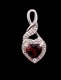 Beautiful Sterling Silver And Ruby Color Pendant