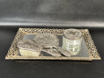 A Vintage Silverplate Vanity Set With Mirror Tray