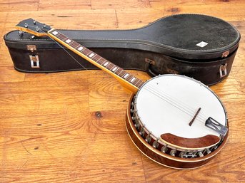 A Vintage Banjo In Case