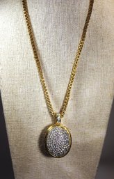 Very Large Signed MONET Gold Tone Necklace 26' Long Having Large Rhinestone Egg Pendant
