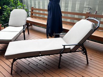 2 Black Outdoor Patio Lounge Chairs With Tan Cushions - Has An Adjustable Back Rest           Back Deck