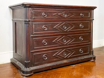 A 19th Century Empire Chest Of Drawers With Paneled Front Plates