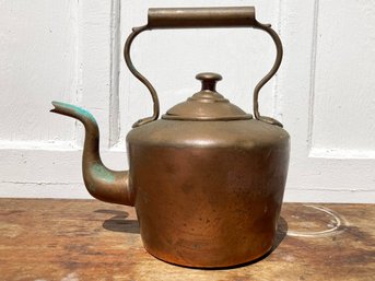 An Antique Copper Kettle