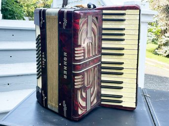 A Vintage Hohner Accordion In Case