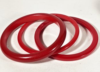 Three Vintage Bakelite Plastic Red Bangle Bracelets