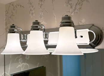 A Chrome And Milk Glass Vanity Fixture