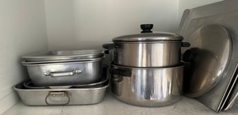 Cupboard Of Cooking Traya, Pots, And Pans