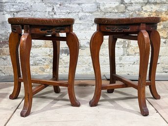 A Pair Of Antique Leather Top Stools