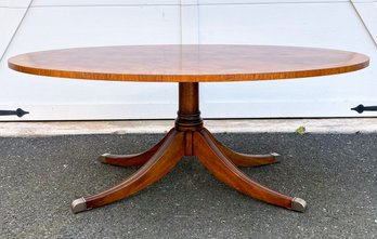 A Large Banded Mahogany And Burl Wood Coffee Table By Ethan Allen
