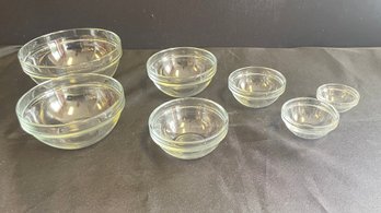 A Set Of Seven Small Glass Mixing Bowls