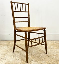 A Vintage Faux Bamboo And Cane Banquet Side Chair