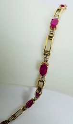 STUNNING 10K GOLD RUBY AND DIAMOND LINK BRACELET