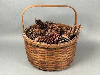 A Large Basket With Pine Combs