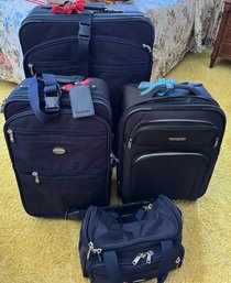 Four Nice Pieces Of Luggage