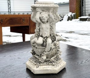 A Cast Stone Cherubic Pedestal