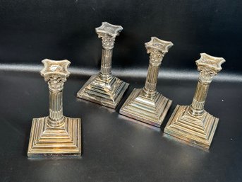 A Handsome Set Of Four Classic Corinthian Column Candlesticks By Rogers Bros., Silverplate