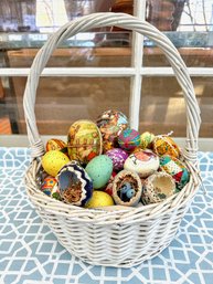 White Vintage Basket With Handle And Large Basket Of A Collection Of Colorful Easter Eggs-