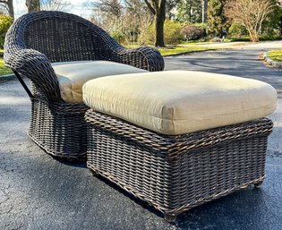 A Vintage Wicker Arm Chair And Ottoman With Linen Cushions By Walters Wicker