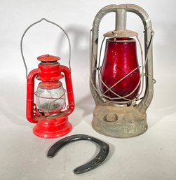 Vintage Camping Lanterns And A Horse Shoe