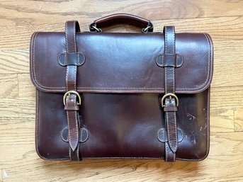 A Classic Brown Leather Briefcase By Henry Louis