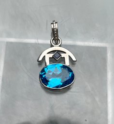 Sterling Silver And Blue Topaz Pendant