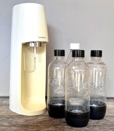 A Soda Stream And Assorted Bottles