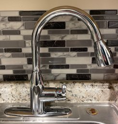 A Stainless Steel Moen Kitchen Faucet