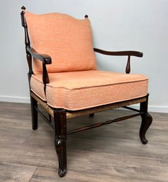 Vintage Rattan And Wood Accent Chair With Salmon Colored Cushion
